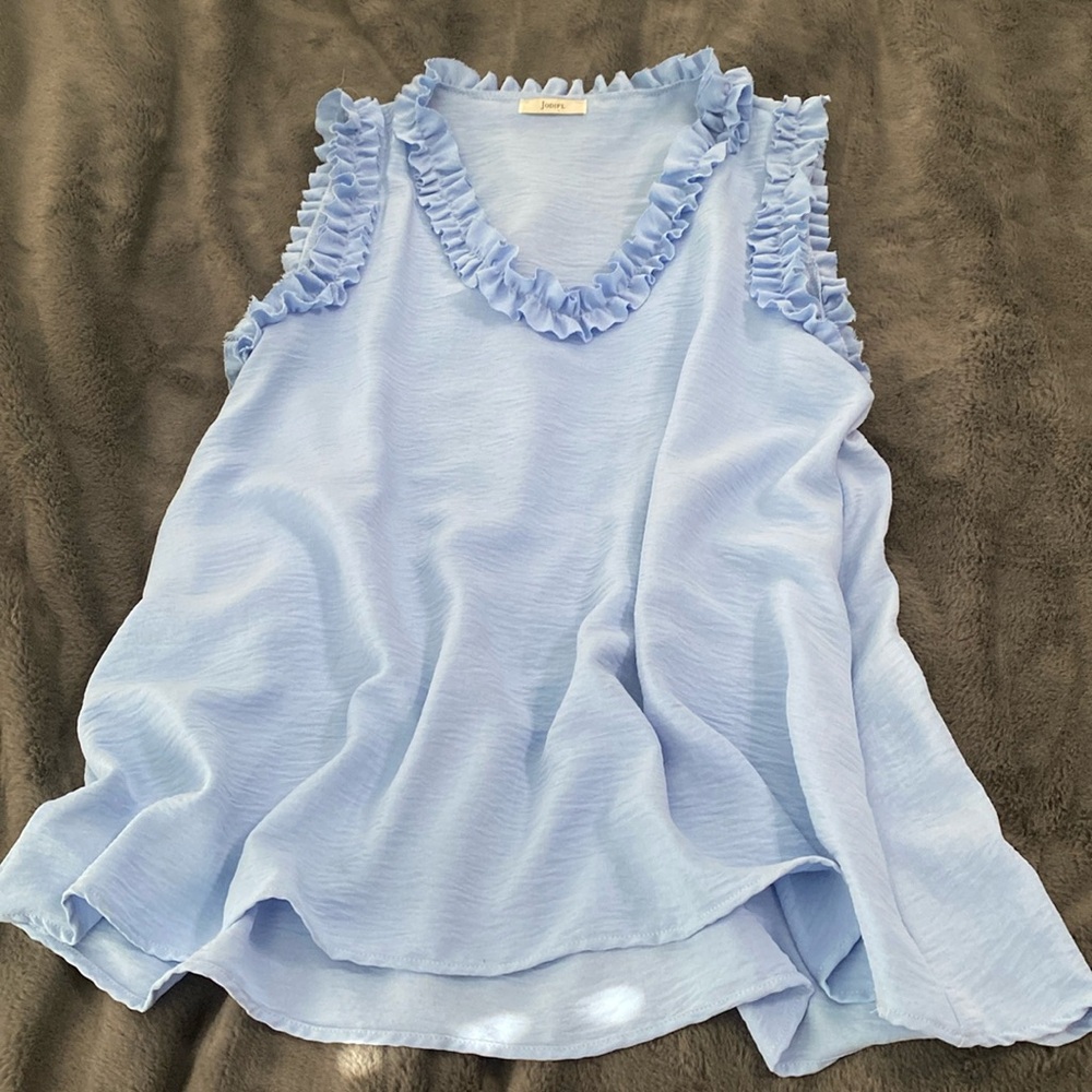 Top with ruffle detail